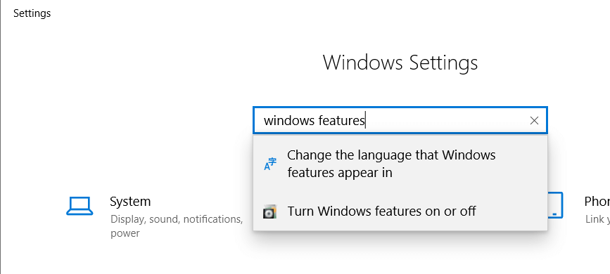Search Windows settings for to turn on Windows features.